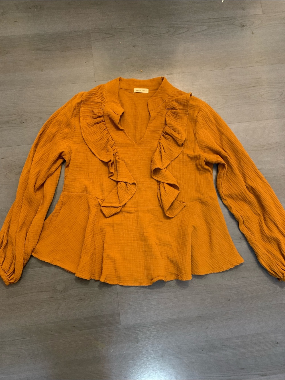 Ruffled V-Neck Peplum Blouse in Mustard